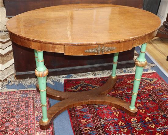 An Empire style oval painted gilt metal mounted mahogany centre table W.108cm